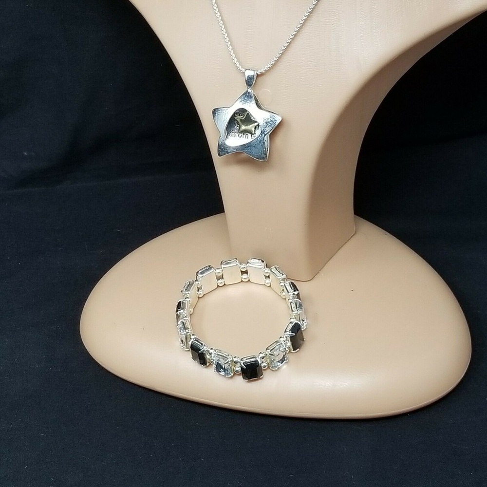 faux silver star necklace and black bracelet set